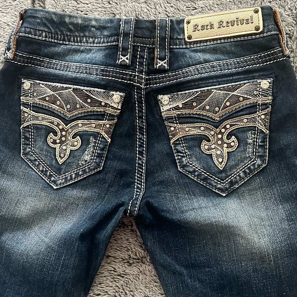 Rock Revival bootcut mid rise denim, 26 waist, 31 inseam, triple stitch ,